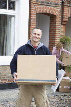 Man and van loading furniture for a local move in Stockwell