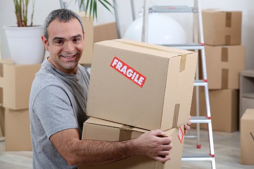 Packing and preparing items for a moving truck in Stockwell