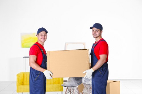 House movers preparing a Stockwell home removal with boxes and protective packing
