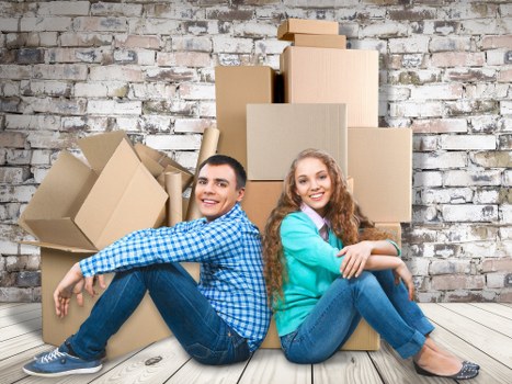 Local moving team handling boxes and household items in Stockwell