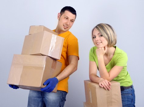 Packing boxes and furniture ready for a local house move