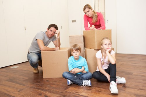 Unpacking boxes and organising a new home after moving in Stockwell