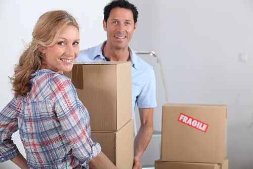 Professional removal team handling furniture for a local move